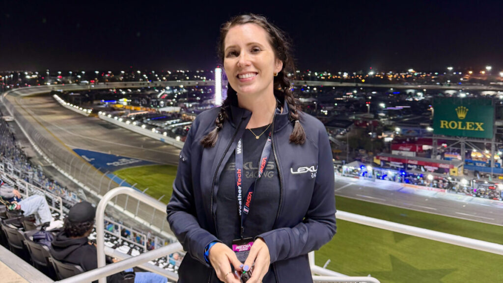 Amanda in front of the Rolex 24 track