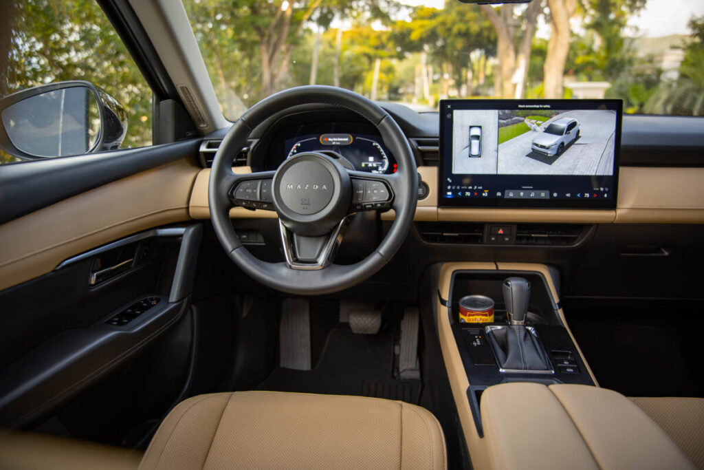 2026 Mazda CX-5 S Premium Plus steering wheel and touchscreen