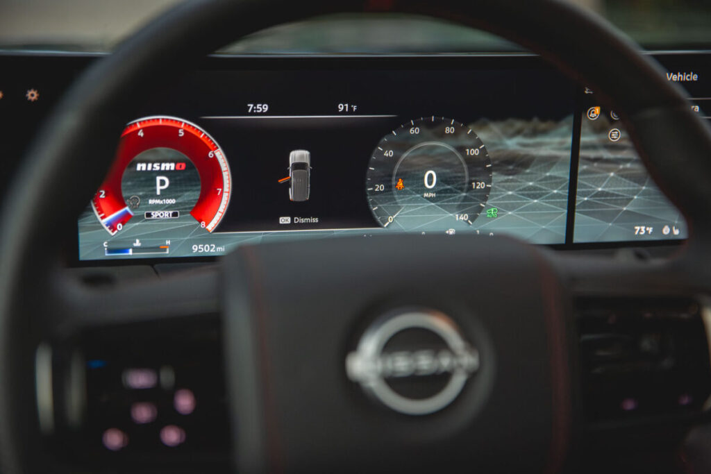 2026 Nissan Armada Nismo digital driver's display through the steering wheel