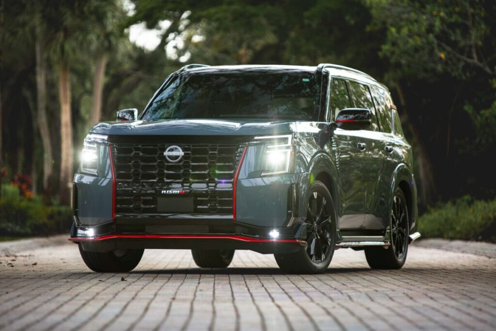 2026 Nissan Armada Nismo front 3/4 view on a tree lined street