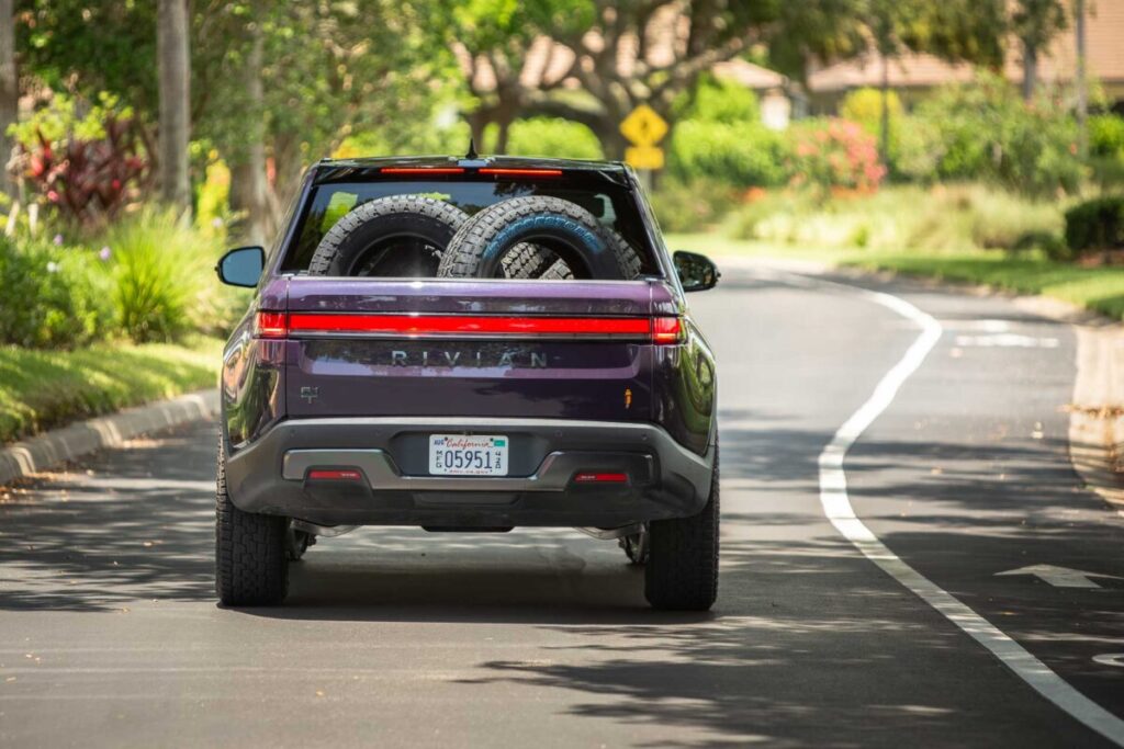 2026 Rivian R1T rear end with tires in the bed