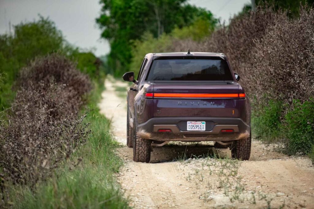 2026 Rivian R1T rear end in the sand